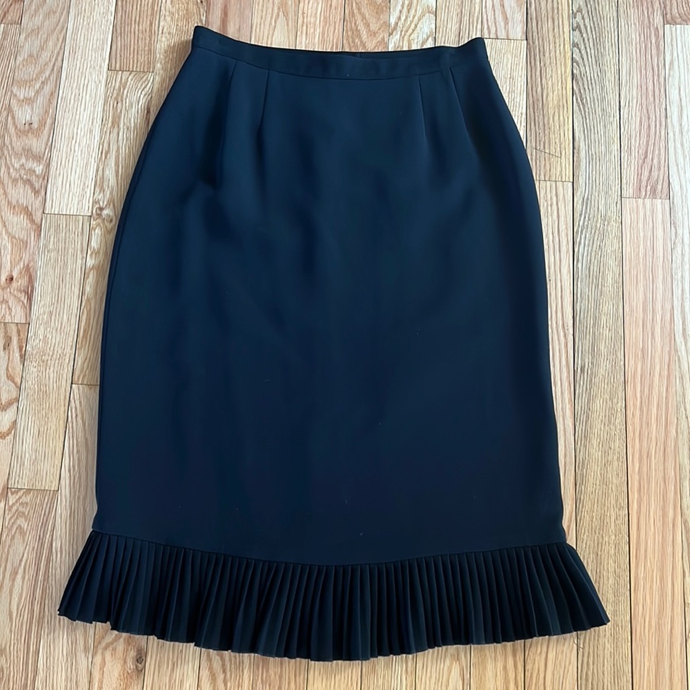 Albert Nipon black knee length skirt, pleated bottom. Women’s size 10